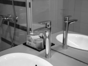 New sink tap next to the shower unit